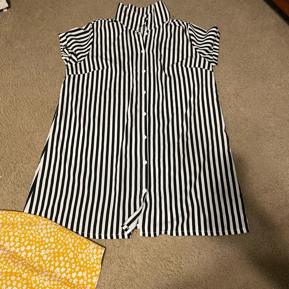 Button up short style dress. Very cute with a belt!